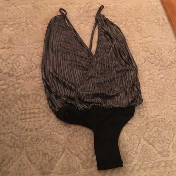 Torn by Ronny Kobo metallic body suit.