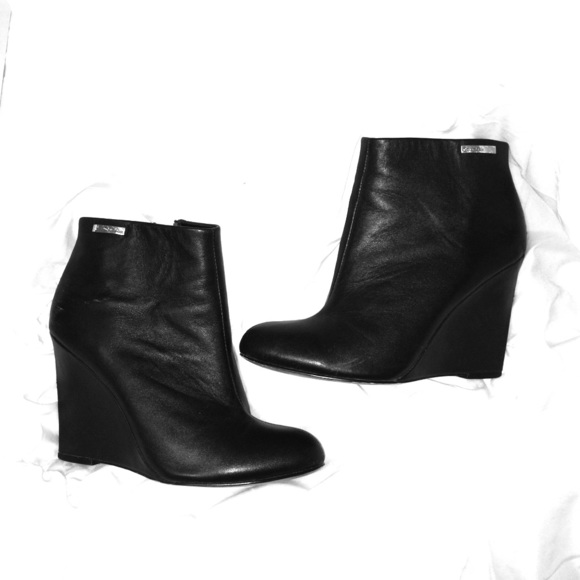 Calvin Klein black wedge booties
