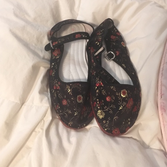 Black and floral flat mary janes