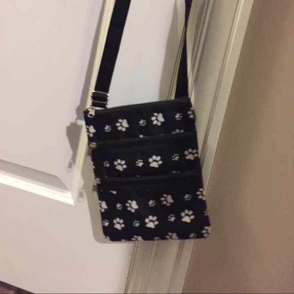 Paw print cross body bag