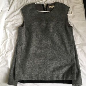 Grey shell with sides that zip up halfway