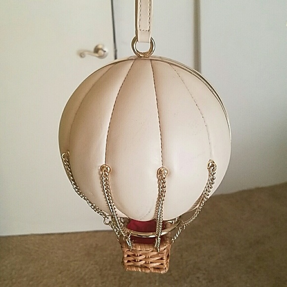 how can you tell if a michael kors bolsa is fake