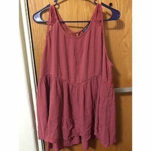 Burnt orange blouse with lace back.