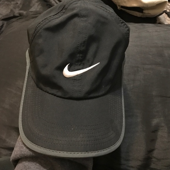 Black Nike hat w/ white check