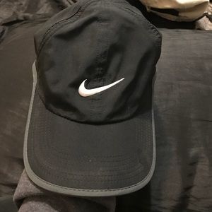 Black Nike hat w/ white check