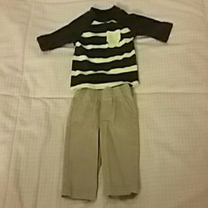Quarter sleeve striped tee, and khaki pants.
