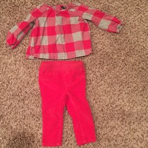Pink cords and matching peasant top.