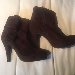 Wild diva brown high heeled booties.