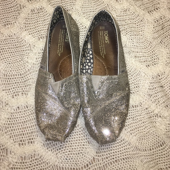 Silver Toms slip-ons