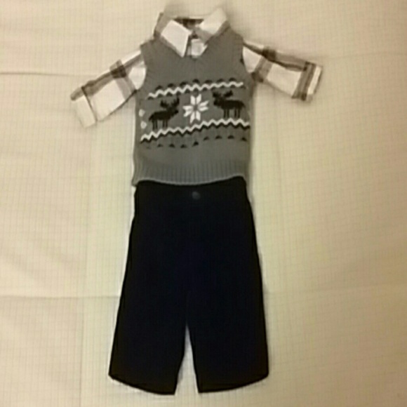 shirt, sweater vest, and felt pants.