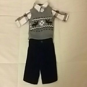 shirt, sweater vest, and felt pants.