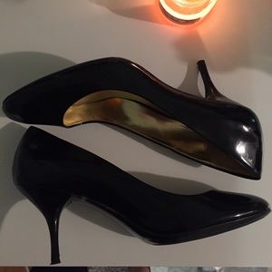 Black patent Coach pumps