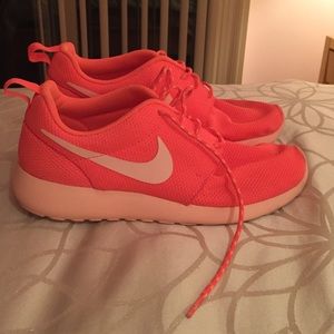 Pink Nike running shoes