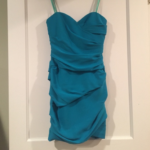 BCBC Turquoise blue strapless mini dress.