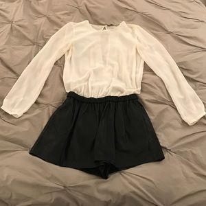White blouse with leather shorts romper