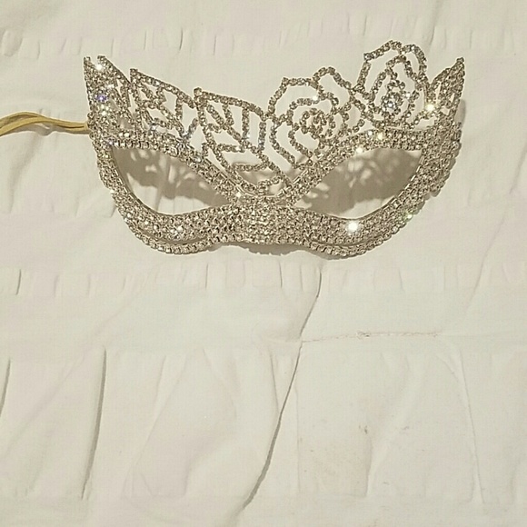 Facial mask studded with stones