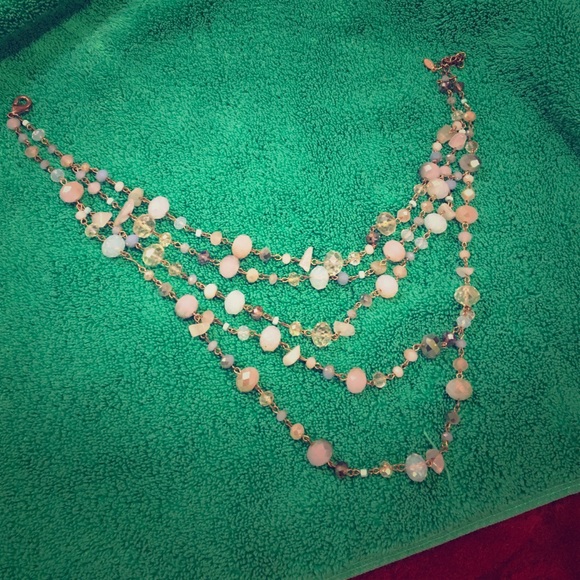 Costume jewelry pastel colored layer necklace