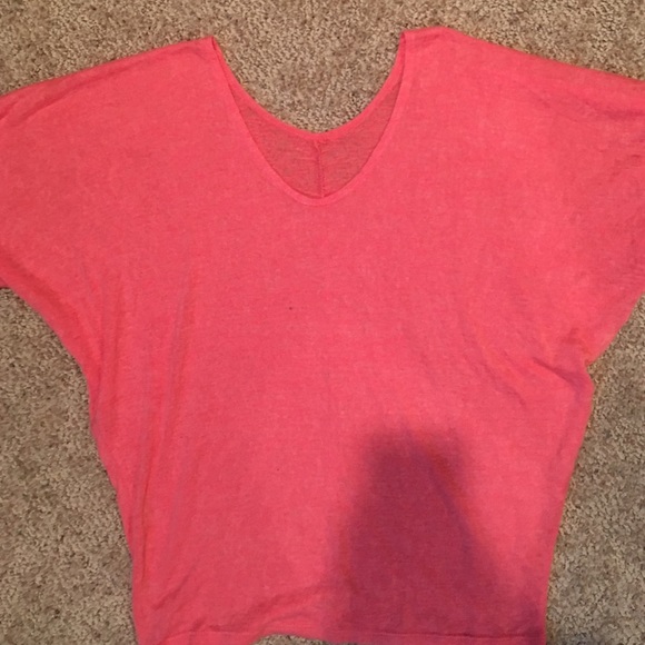 Maurice's peach shirt