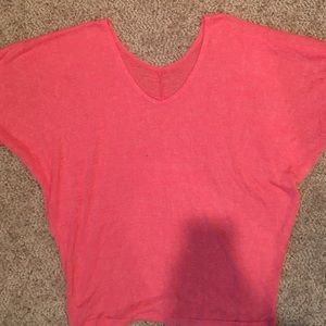 Maurice's peach shirt