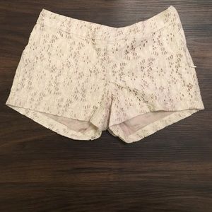 Off-white lace shorts