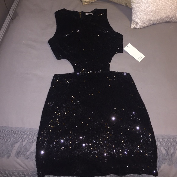 New Year’s Eve Open back black sequin mini dress