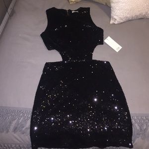 New Year’s Eve Open back black sequin mini dress