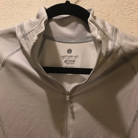 Striped grey and white dri fit pull over