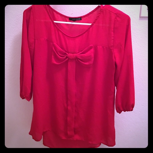 Red blouse worn once. Perfect for Christmas!