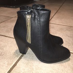 Brand new black booties.