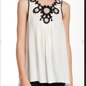 Mac studio sleeveless high low , almost new