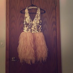 Bebe gold sequin and feather dress