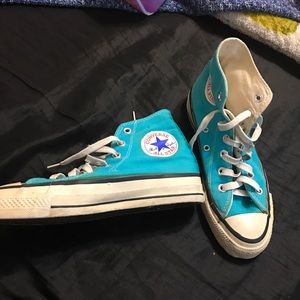Aqua blue high top converse