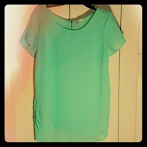 Sheer mint green/teal top with zipper in back