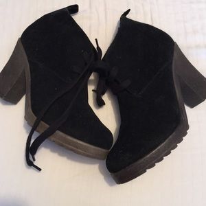 Black lace up booties.