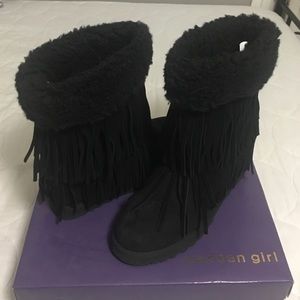 Black fringe suede wedge booties.