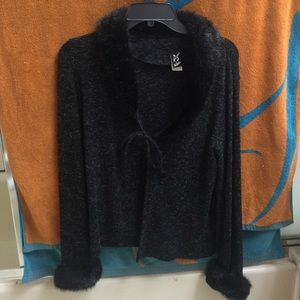 Pullover sweater style with tie in front