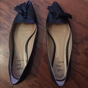 Black leather flats