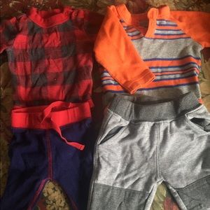 Two long sleeved comfy baby outfits