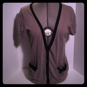 Dark tan sweater with black trim