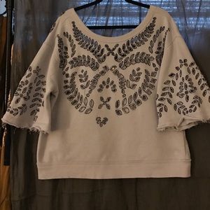 Free People sweatshirt.