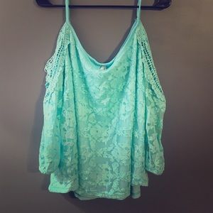 Light blue/teal shirt