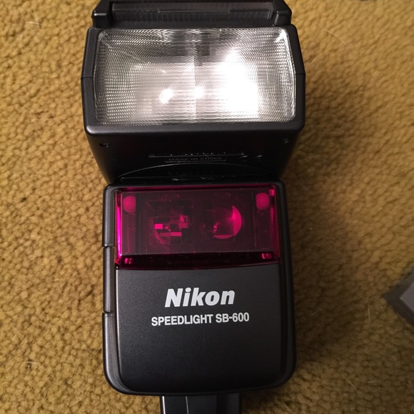 Nikon D5000 with 70-300 lens and speedlight