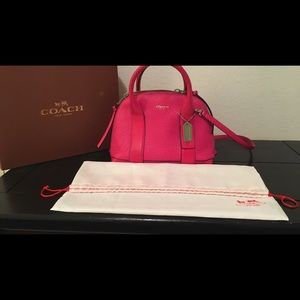 Pink Coach cross body satchel.
