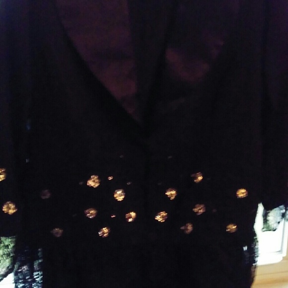 Women's elegant 2-piece black skirt suit.