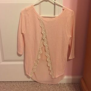 Pink sweater with crochet back