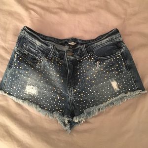 Glitzy jean booty shorts