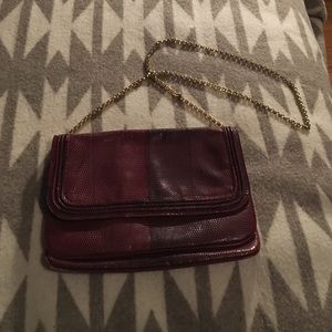 Vintage maroon leather clutch