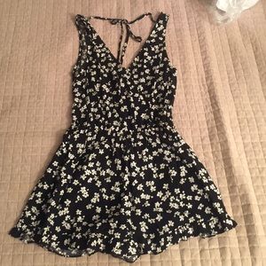 Floral romper with ruffled bottom