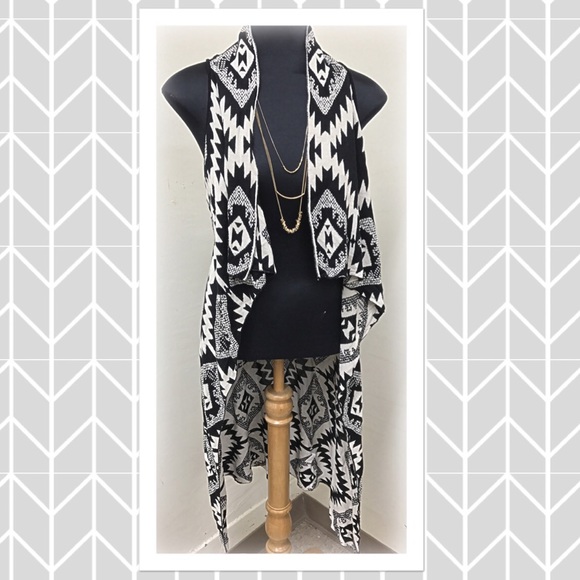 Black and white print long sleeveless vest