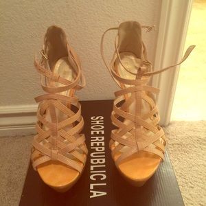 Nude gravity wedge heels
